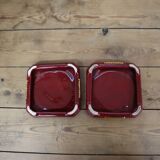 Pair of burgundy ceramic coasters or bottles with gold trim