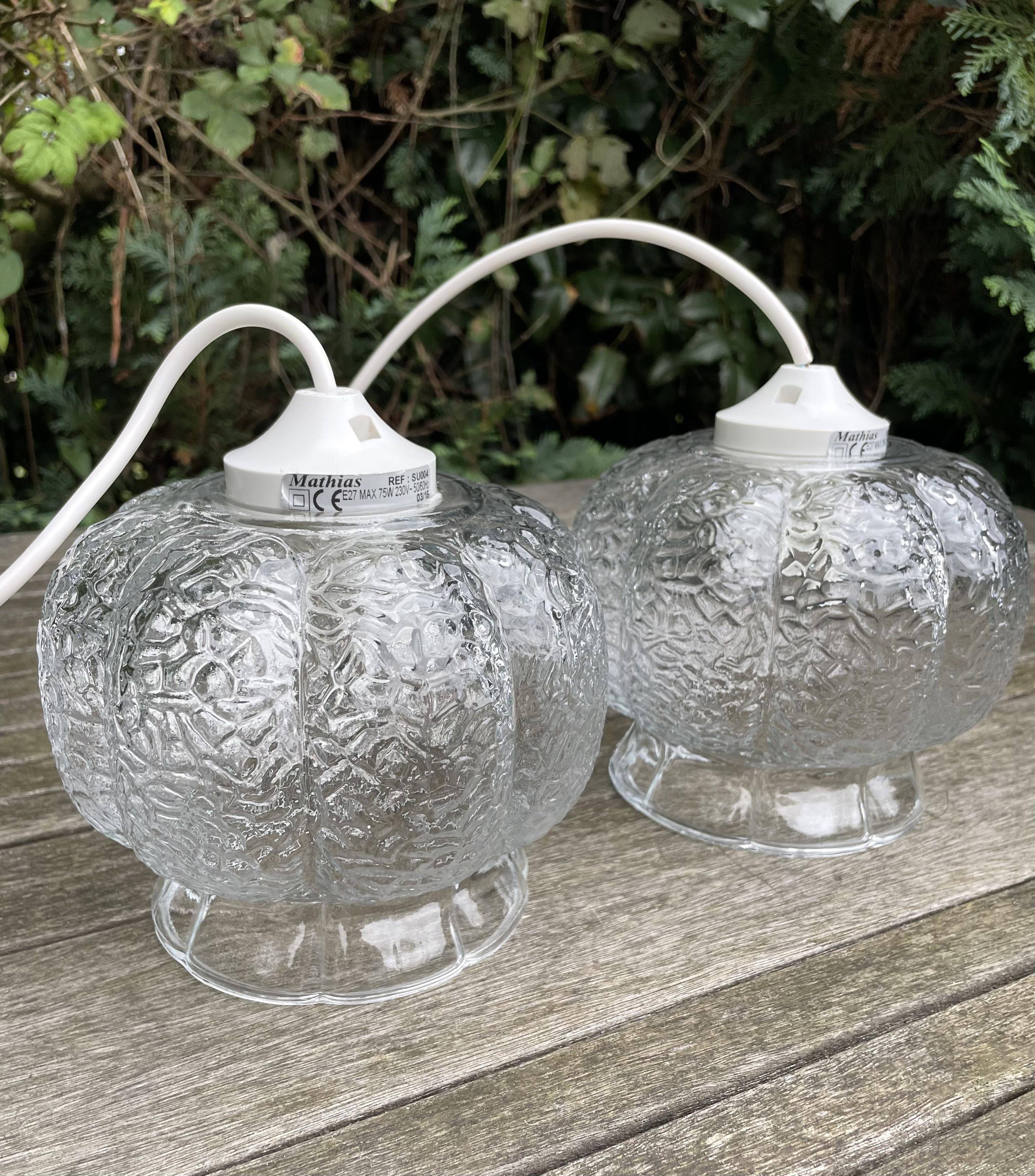 Double Mathias pendant lights ref SU004 in transparent glass in relief corolla shape