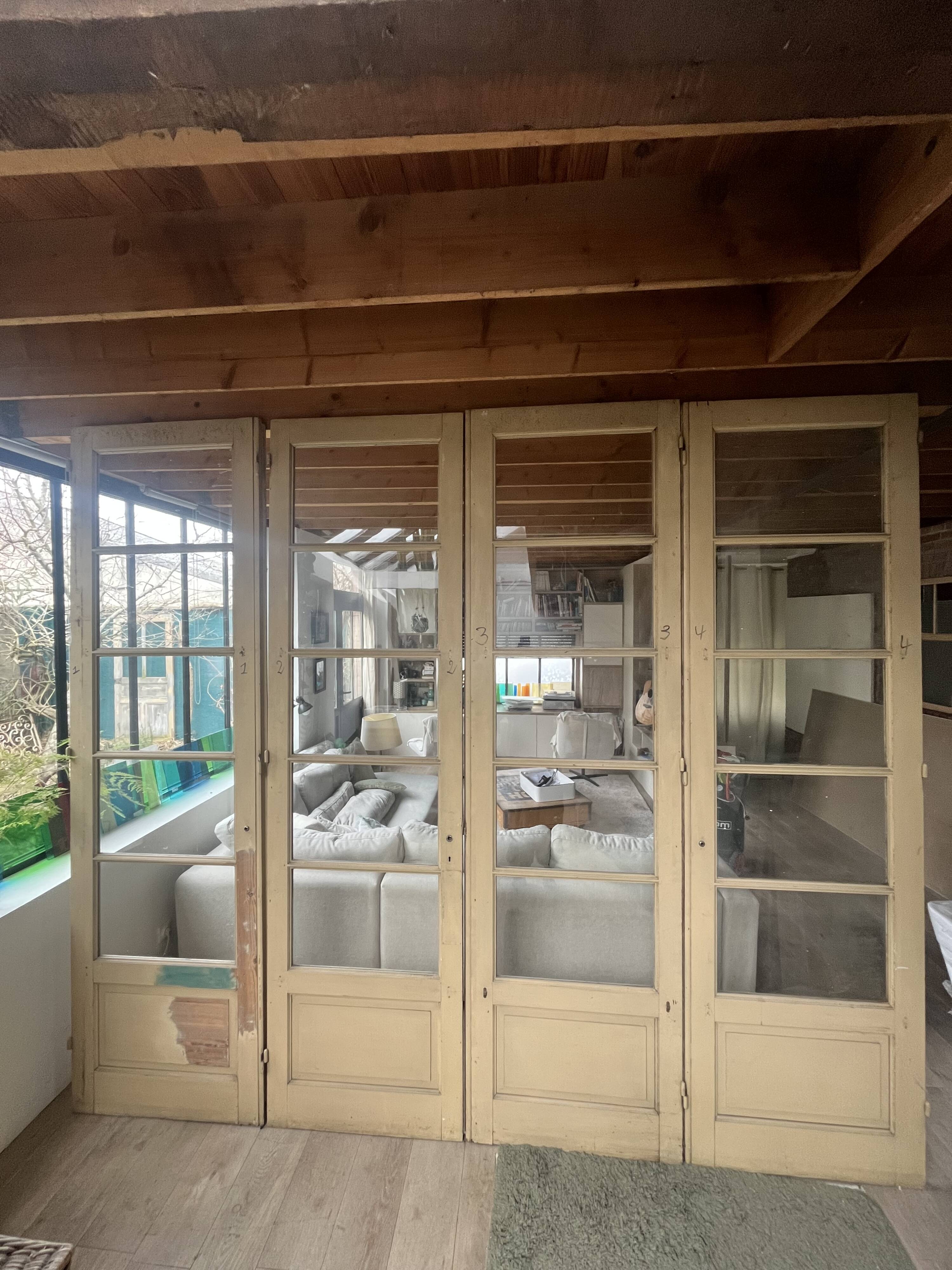 set of four large glass partition doors