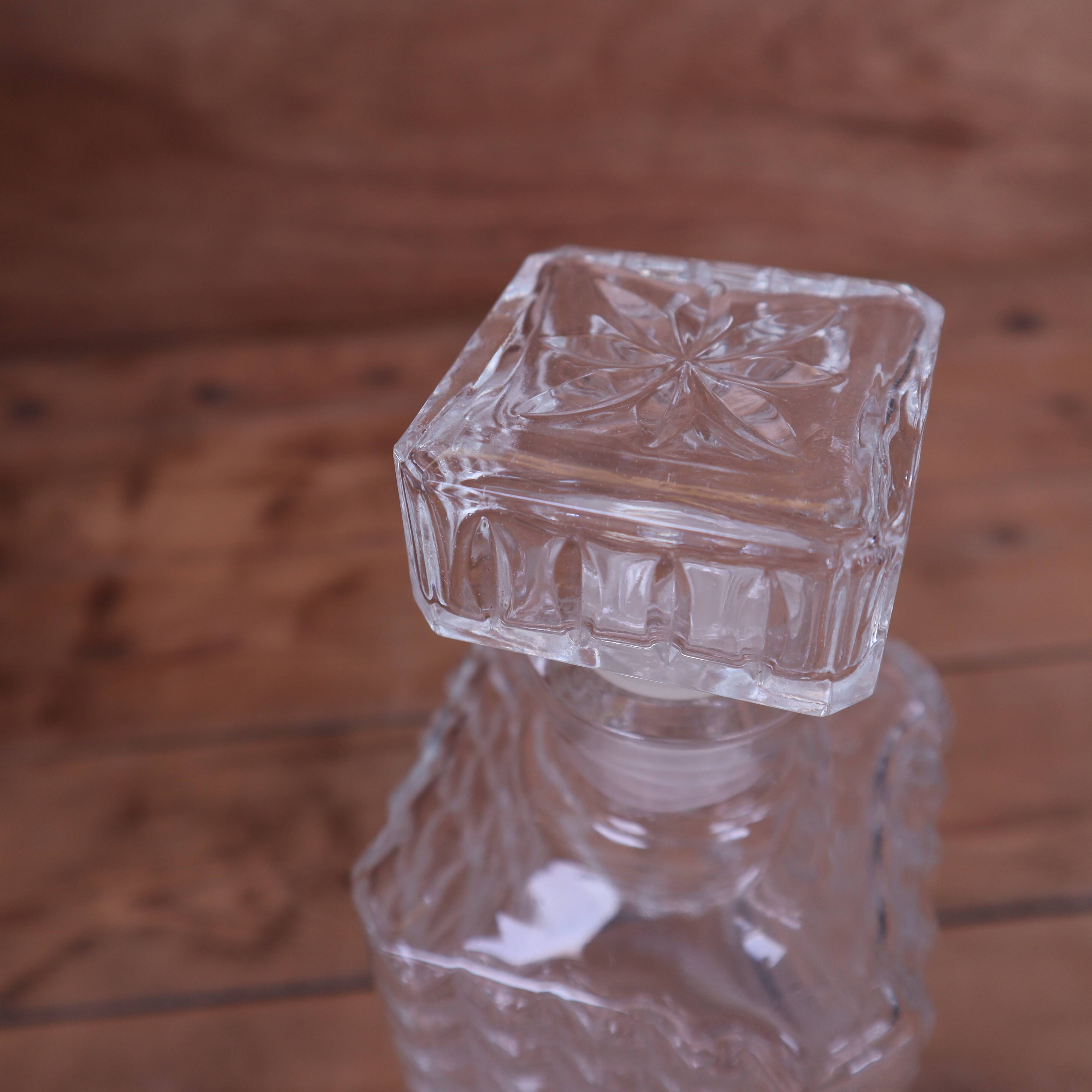 Vintage cut glass whisky decanter with diamond point design, 1960s.