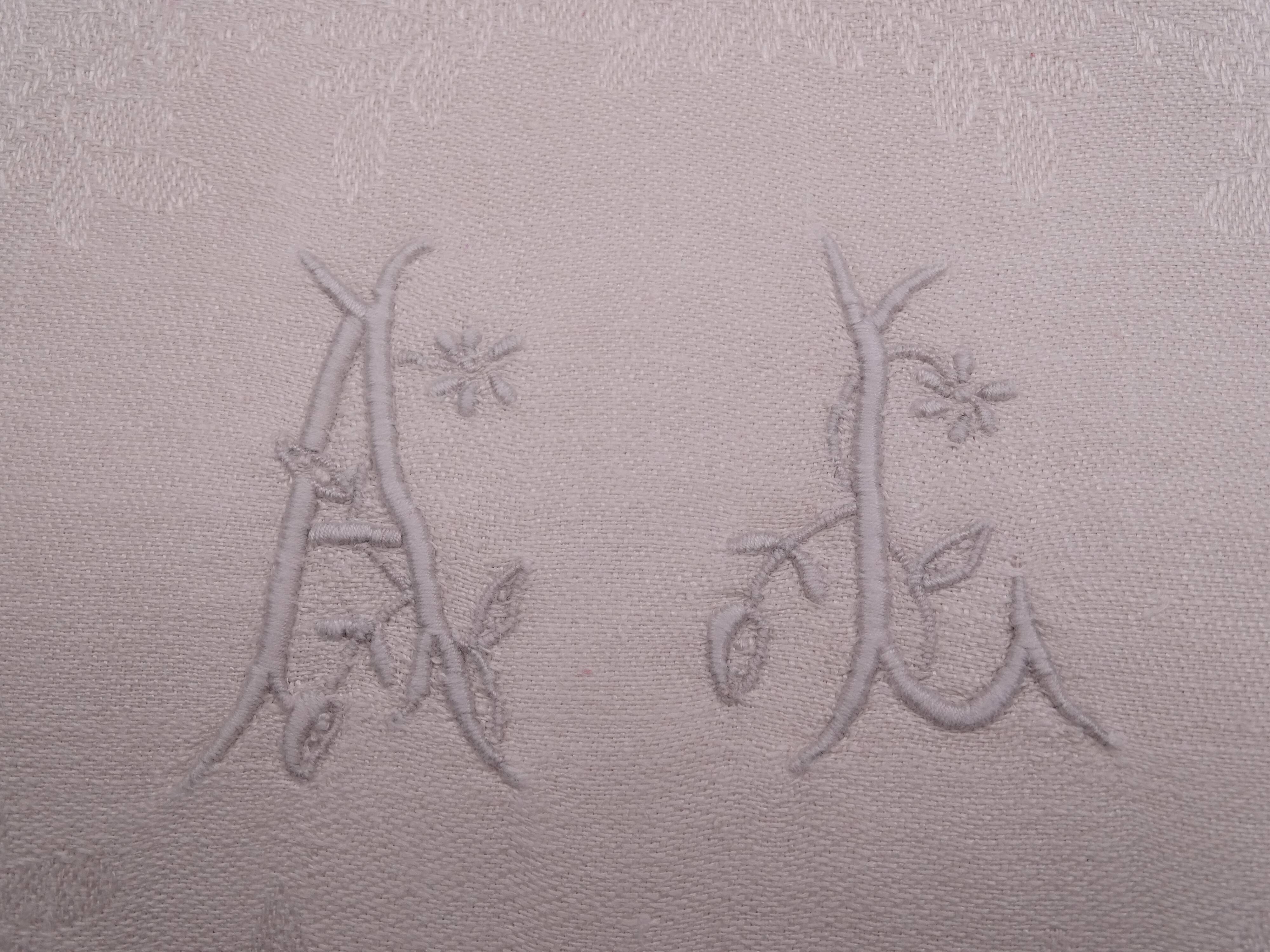 12 monogrammed cotton pad towels AL - Circa 1900