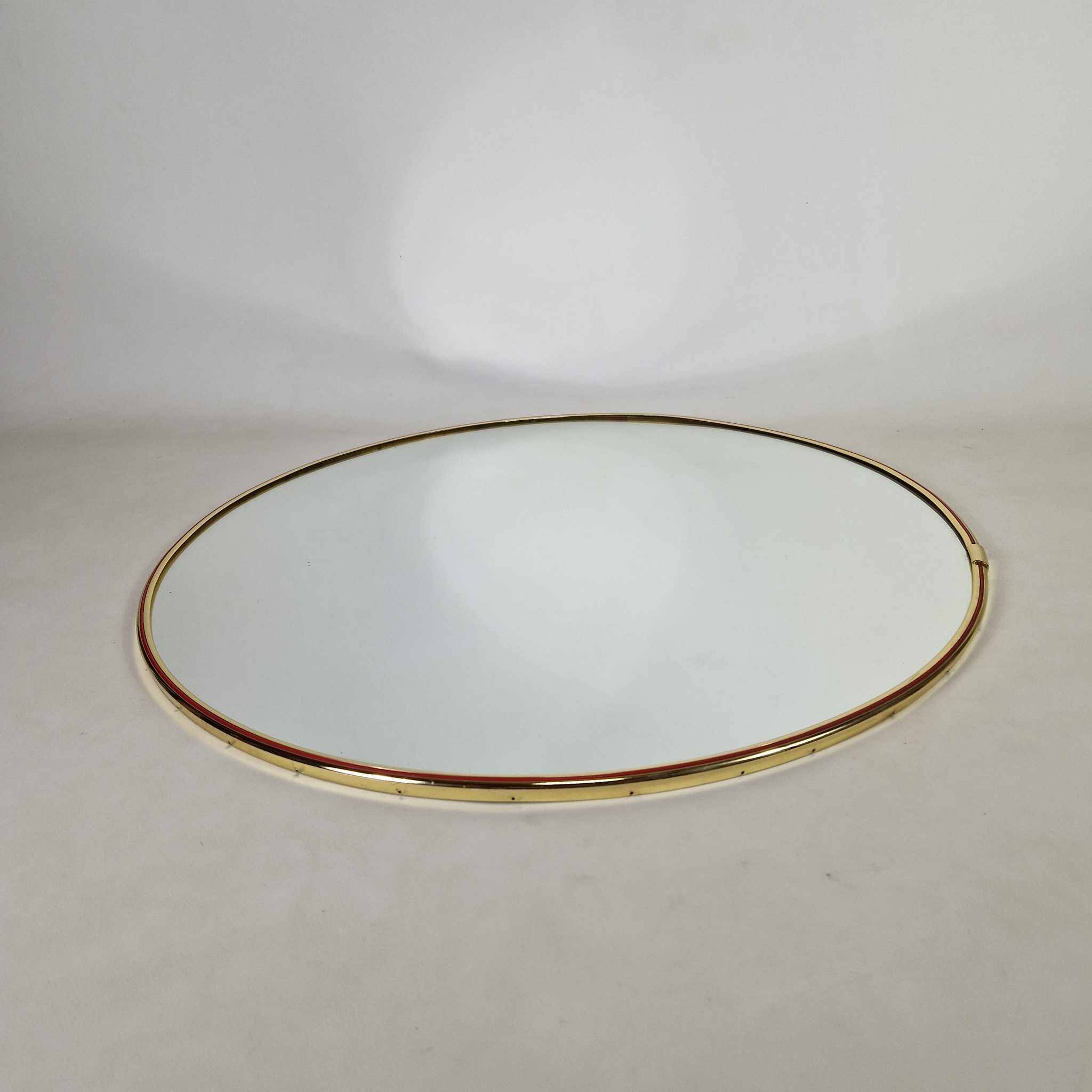 Grand miroir mural rond des années 60.