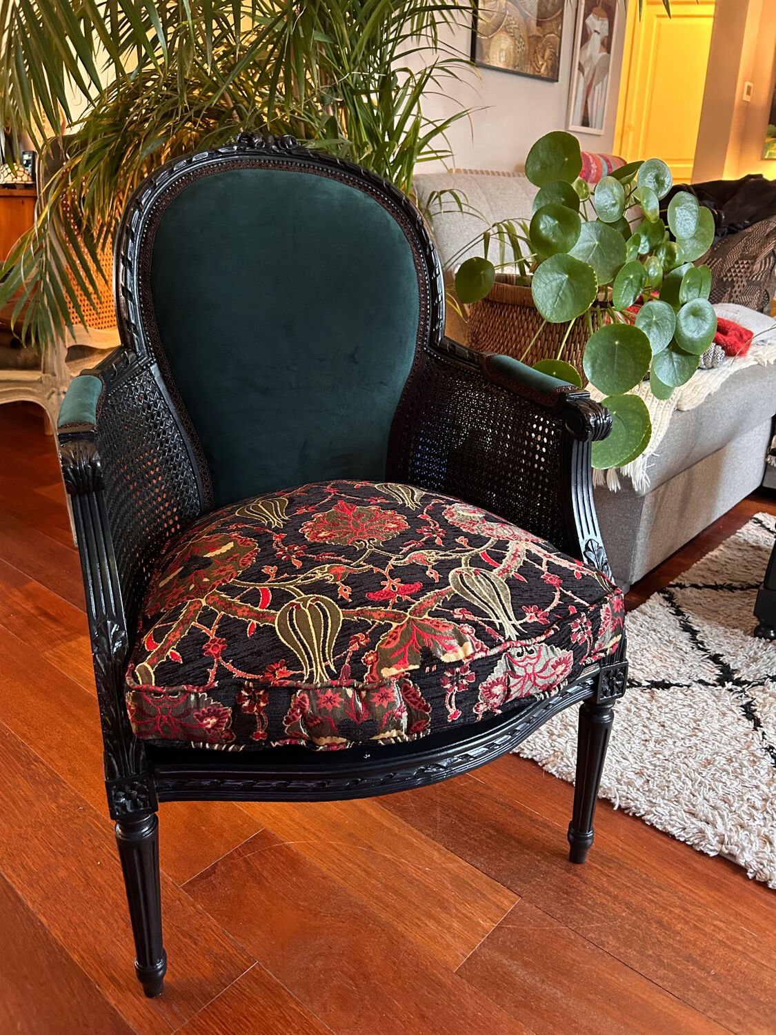 Louis XVI armchair with caning and dark green velvet