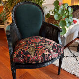 Louis XVI armchair with caning and dark green velvet