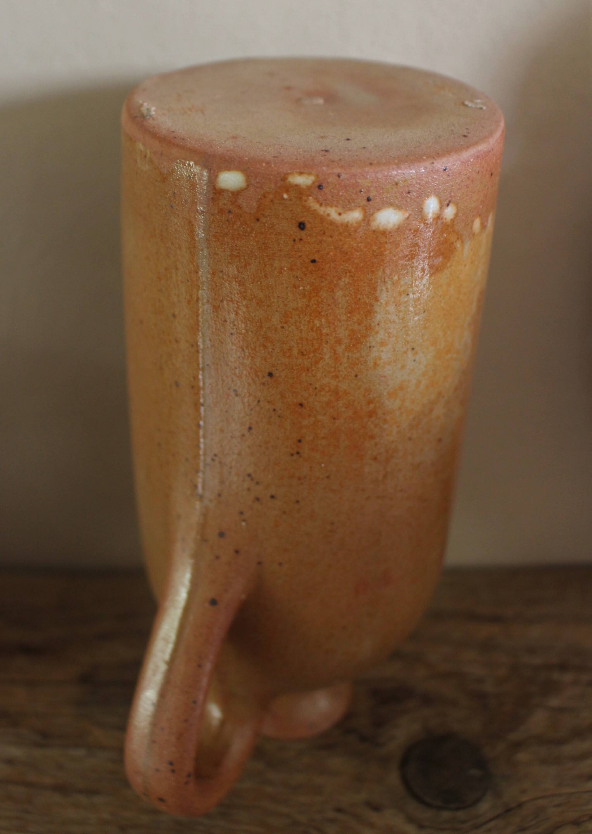 Vintage stoneware liqueur bottle with handle