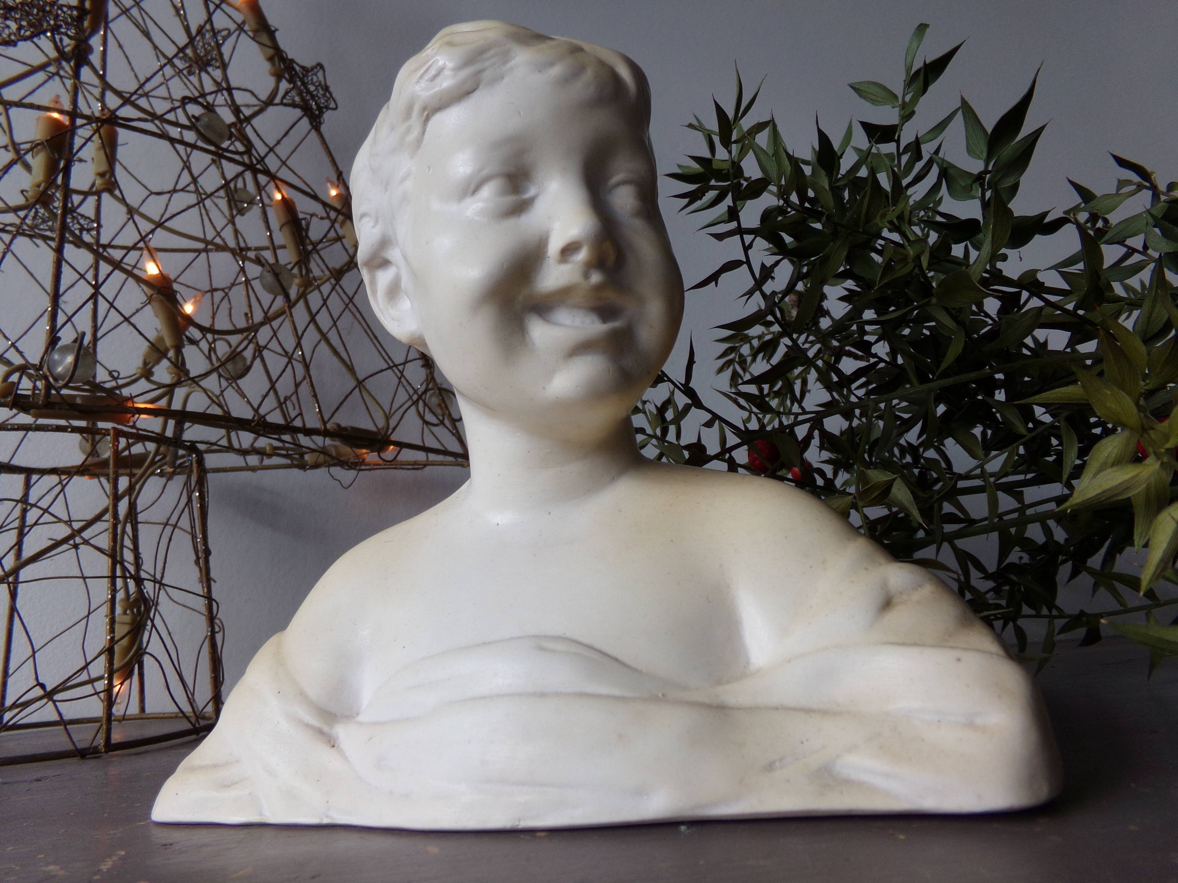 Bust of the laughing child