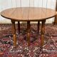 Round cherry wood table, 6 feet, Louis Philippe style with 2 extensions.