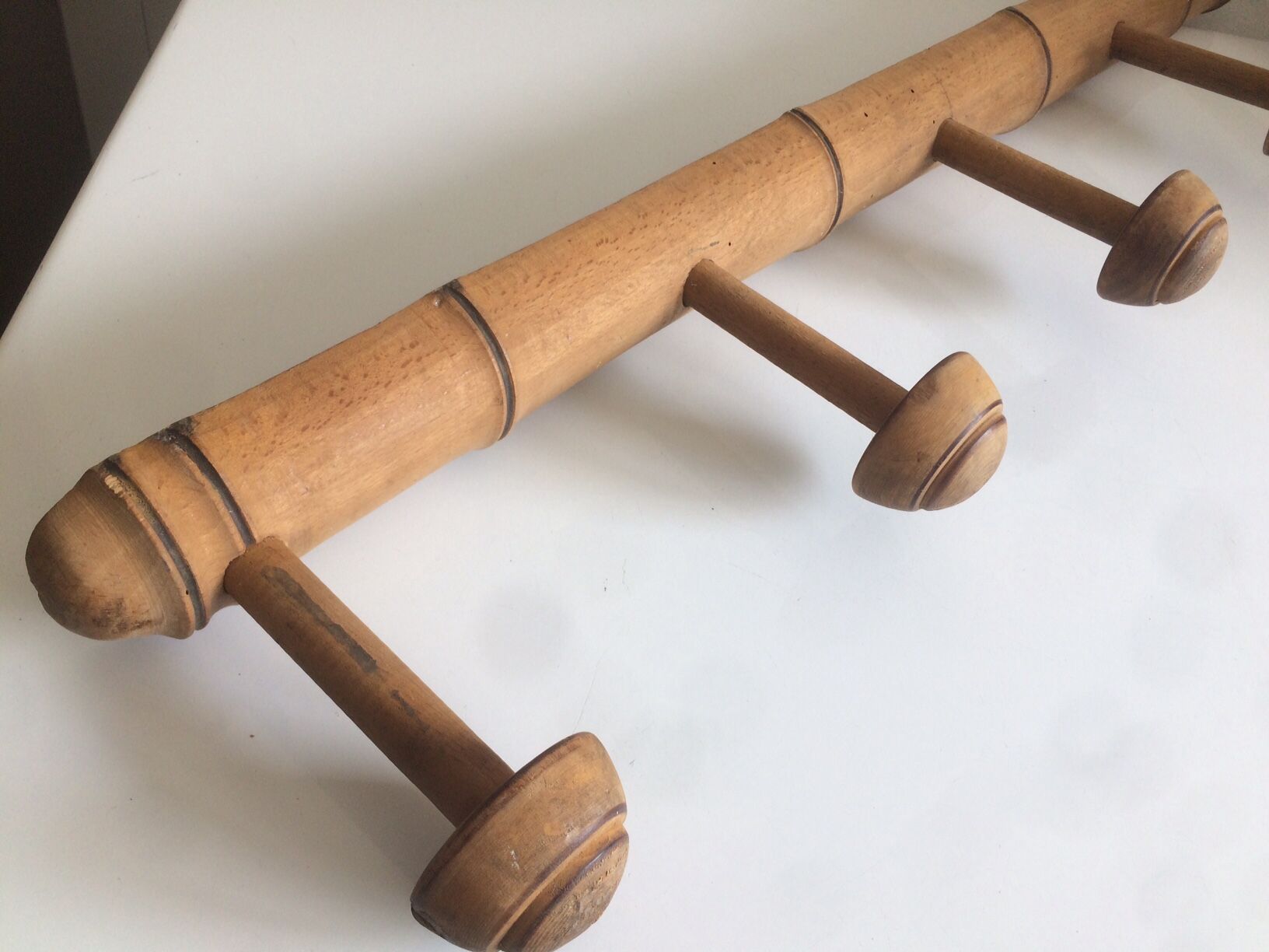5 vintage wooden coat racks.