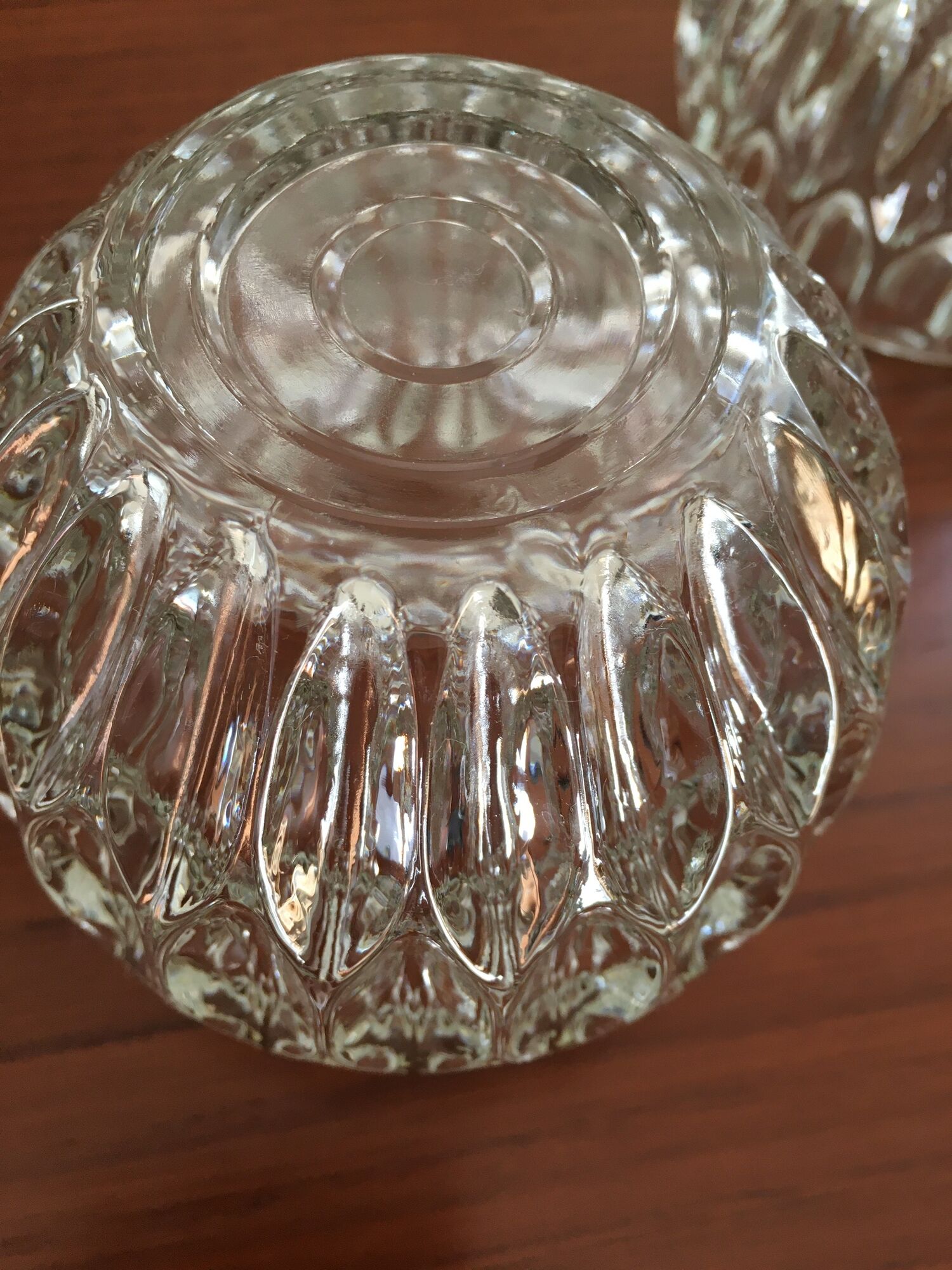 Duo of chiseled glass photophores