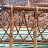 Rattan bassinet with hood arches