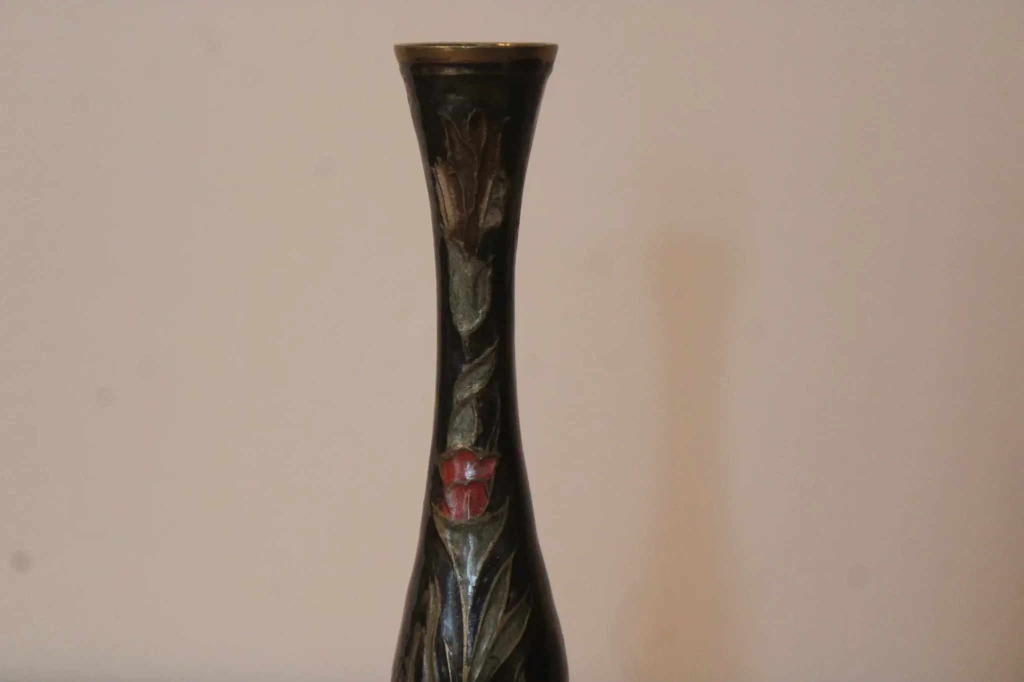 Vintage brass soliflore vase with black, red, and green floral decoration – H 18 cm