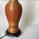 Vintage 1970s Chinese lamp base in woven bamboo on a porcelain vase