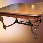 Table en chêne têtes de lion