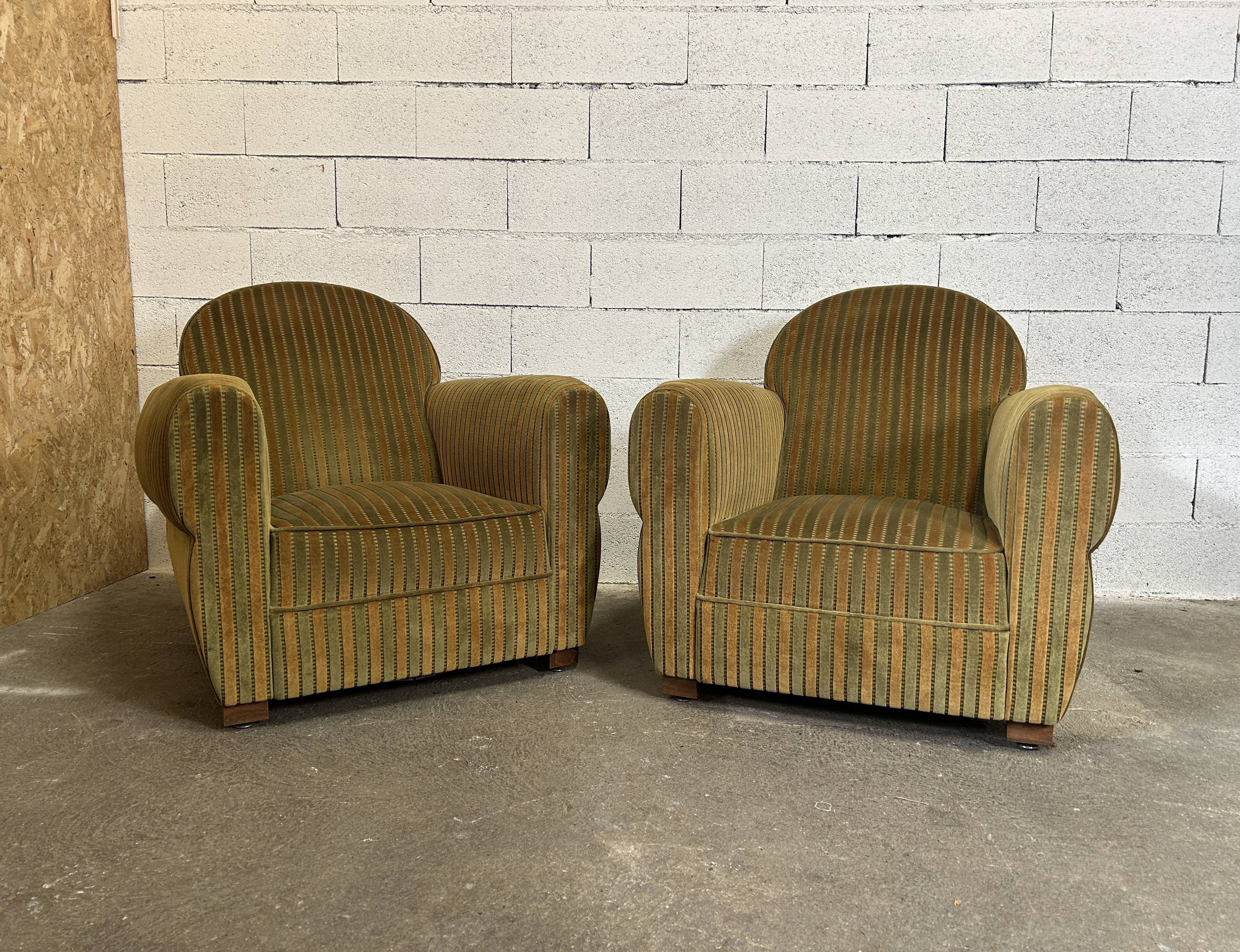 Pair of green fabric armchairs