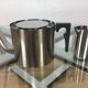 Arne Jacobsen stainless steel teapot and milk pot, Cylinda Line, by Stelton