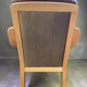 Chocolate leather armchair, wooden structure