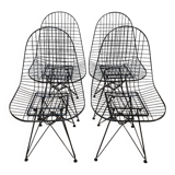 Set of 4 vintage black Eames chairs