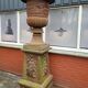 Large old cast iron planter on pedestal