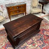 Chest in carved natural wood of the eighteenth century