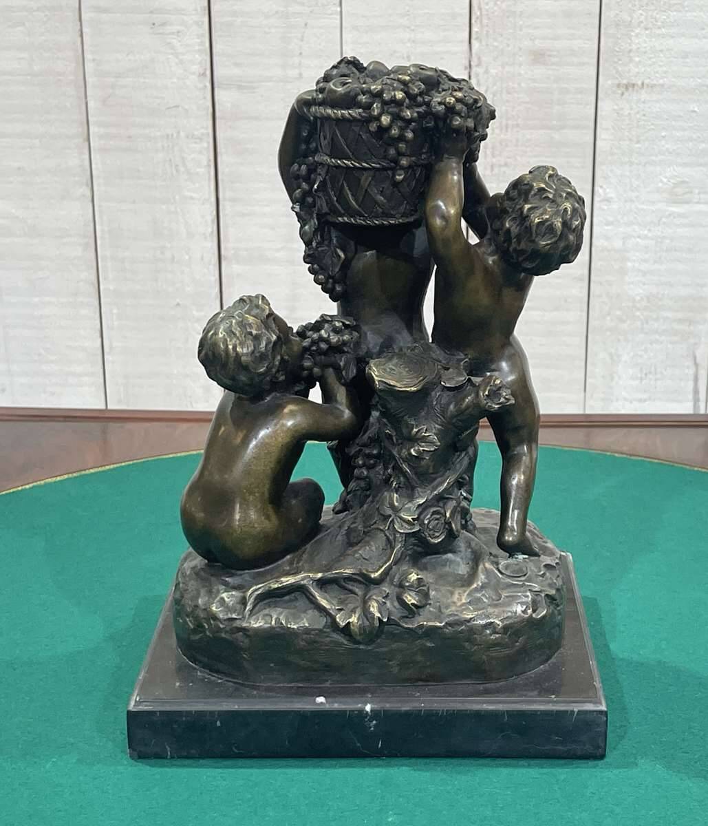 Bronze piece depicting 3 cherubs signed J. DASTE - 1950s