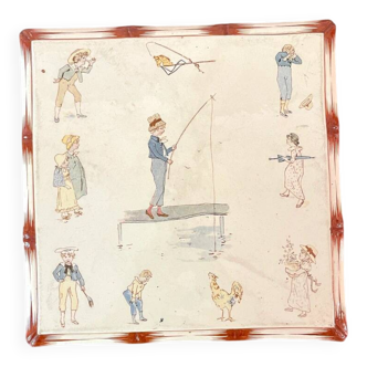Sarreguemines earthenware trivet with children's decoration by Richard