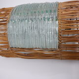 Glass and rattan sconce