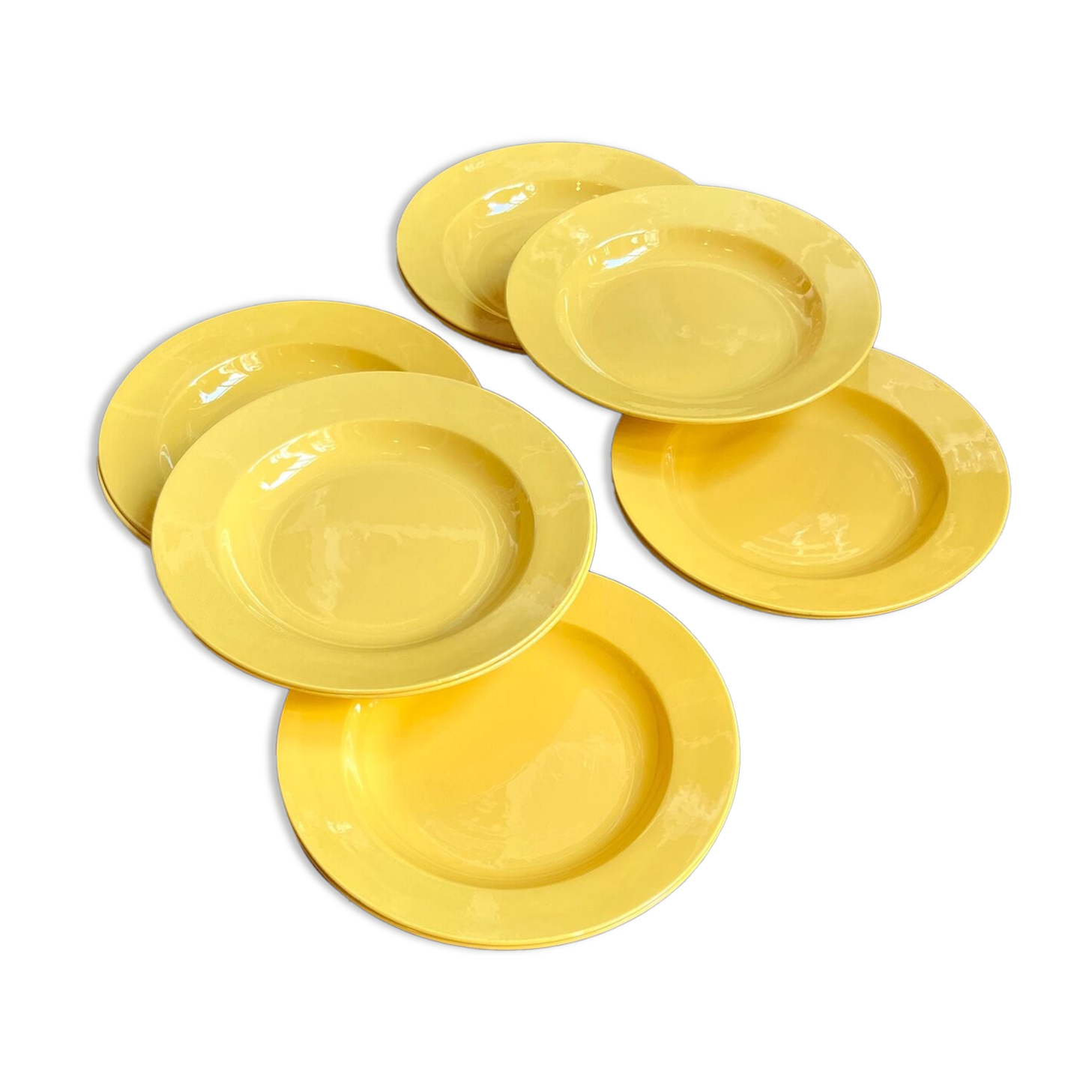 11 hollow plates in yellow earthenware