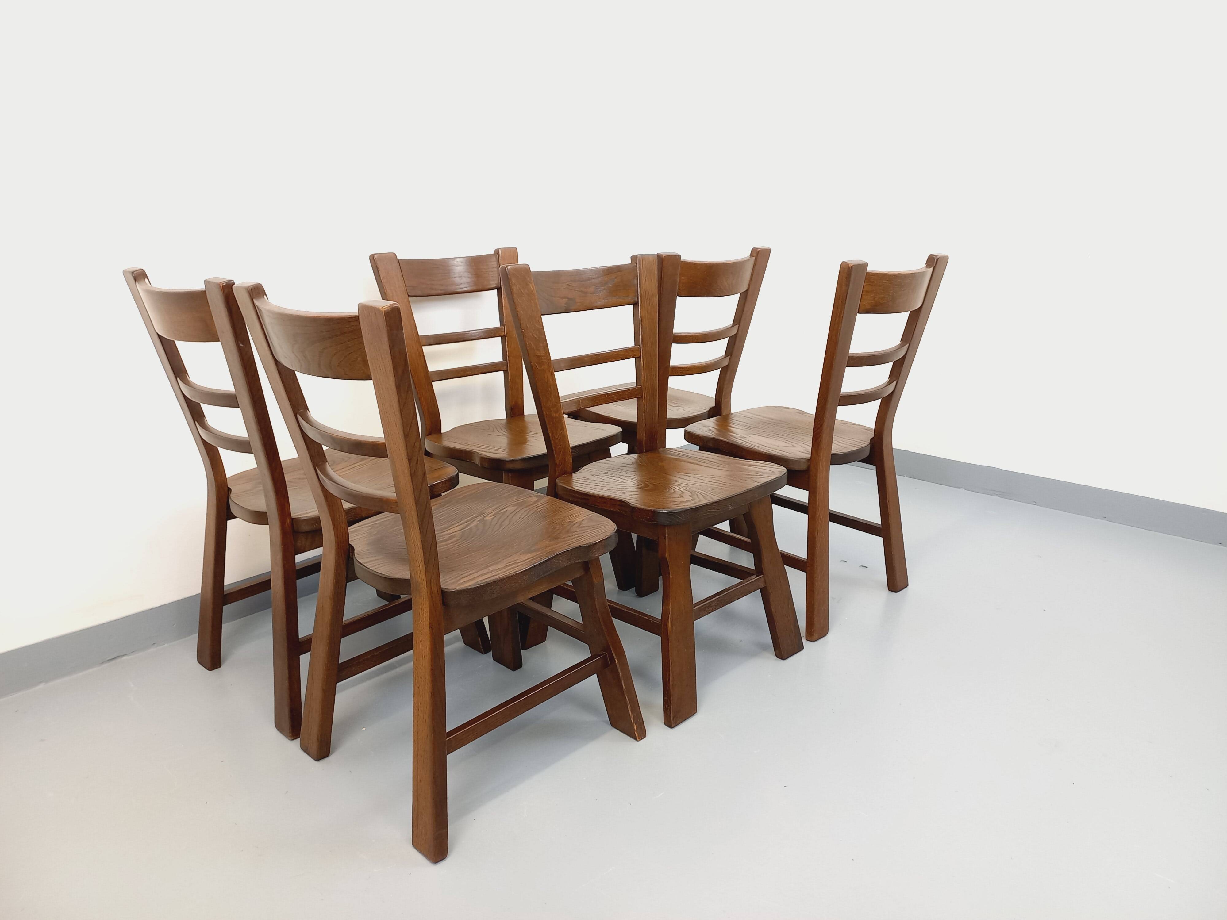 Set of 6 vintage brutalist oak chairs from the 1950s.