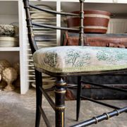 Napoleon III chair in blackened wood and green toile de Jouy.