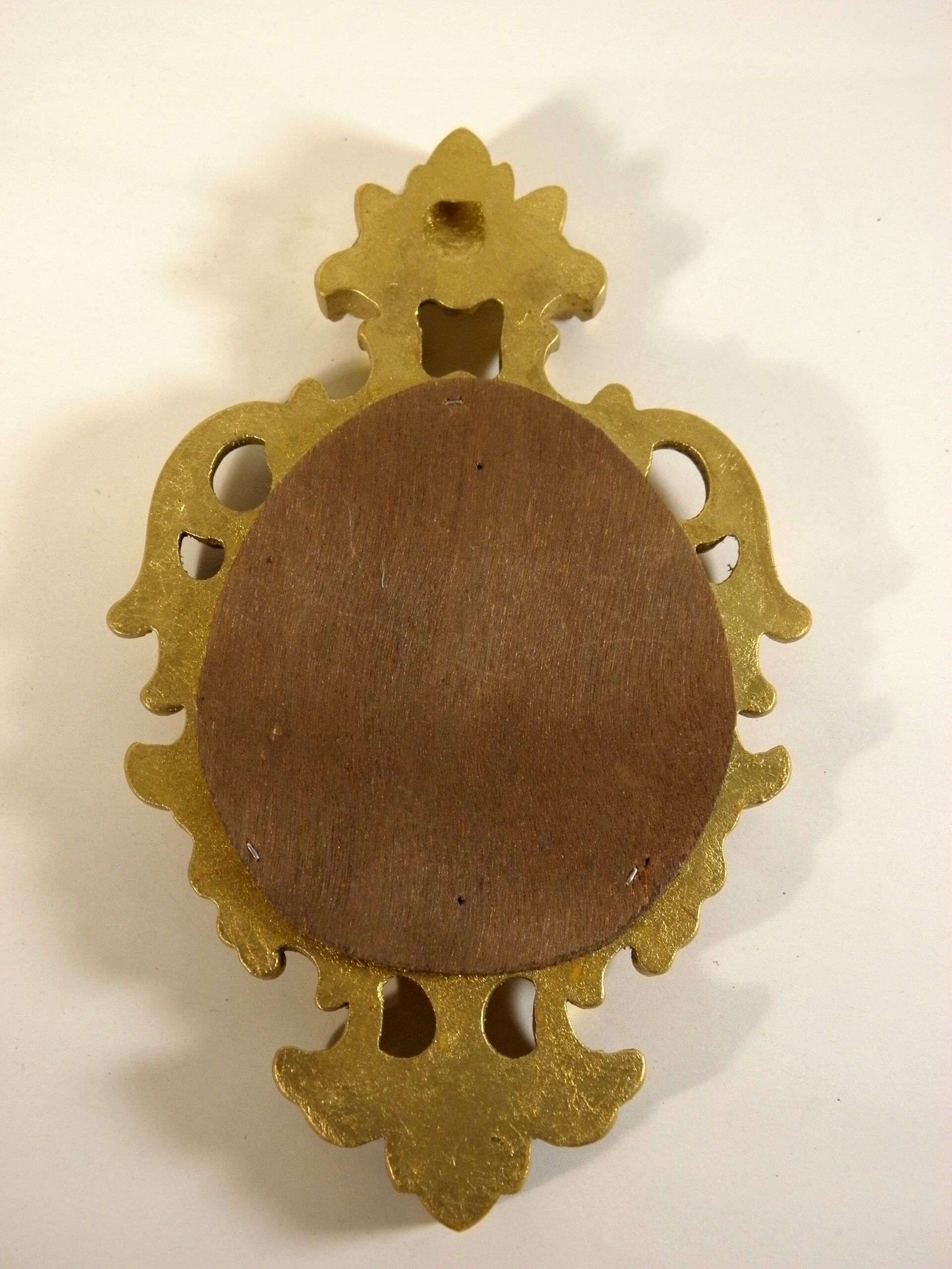 Small golden baroque mirror 24 x 15 cm