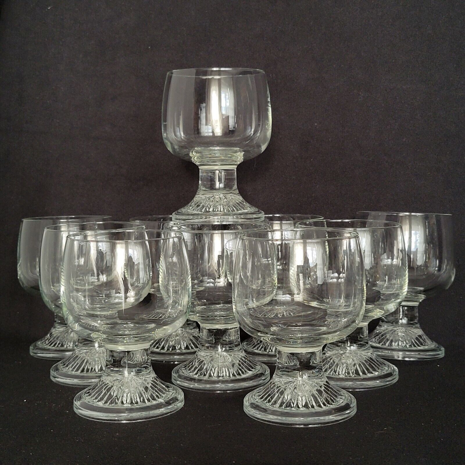 10 vintage stemmed glasses in molded glass