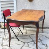 Solid wood table with curved legs