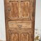 Rustic and vintage wardrobe in raw wood, wabi-sabi style.