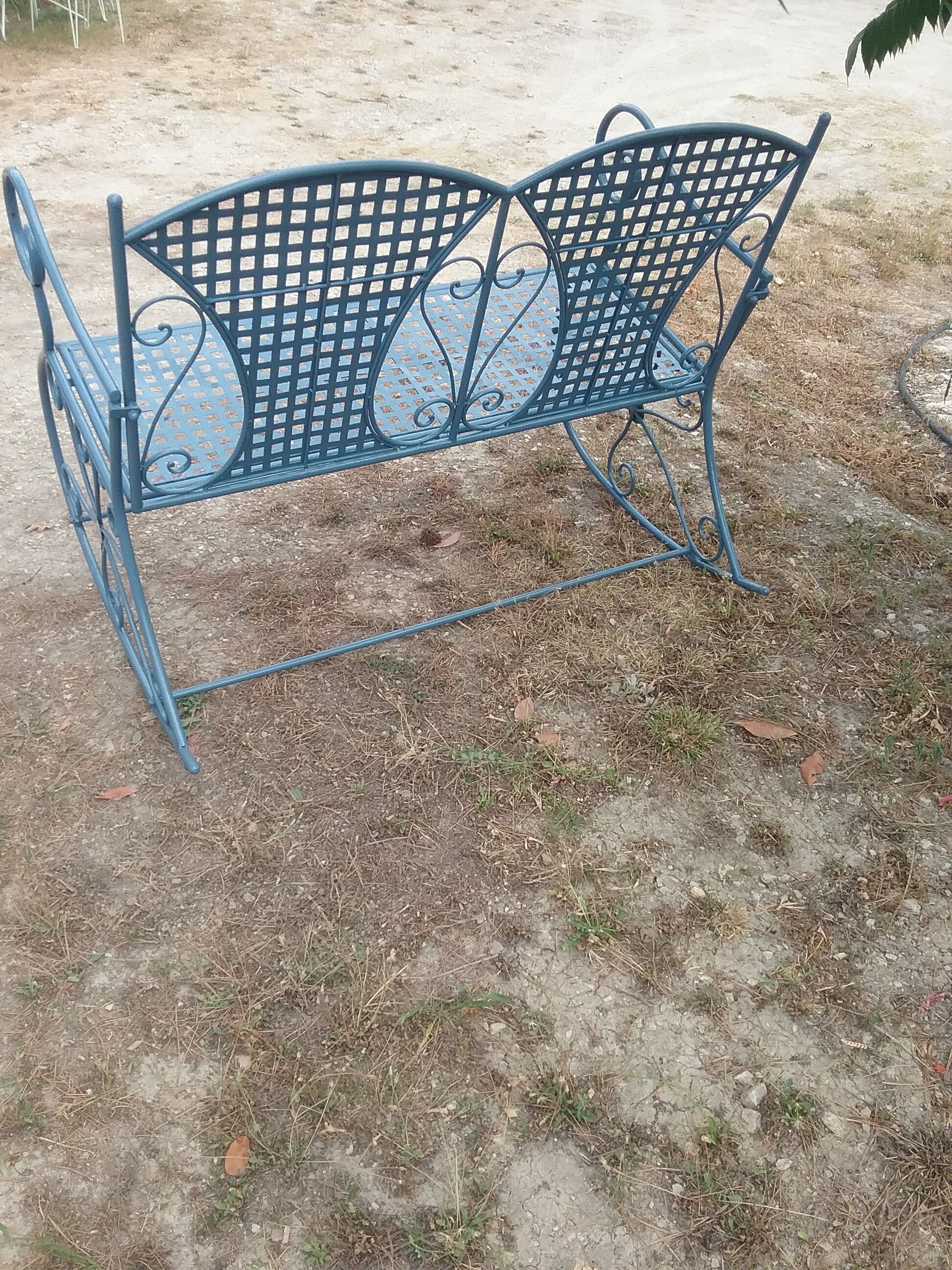 Large wrought iron rocking chair
