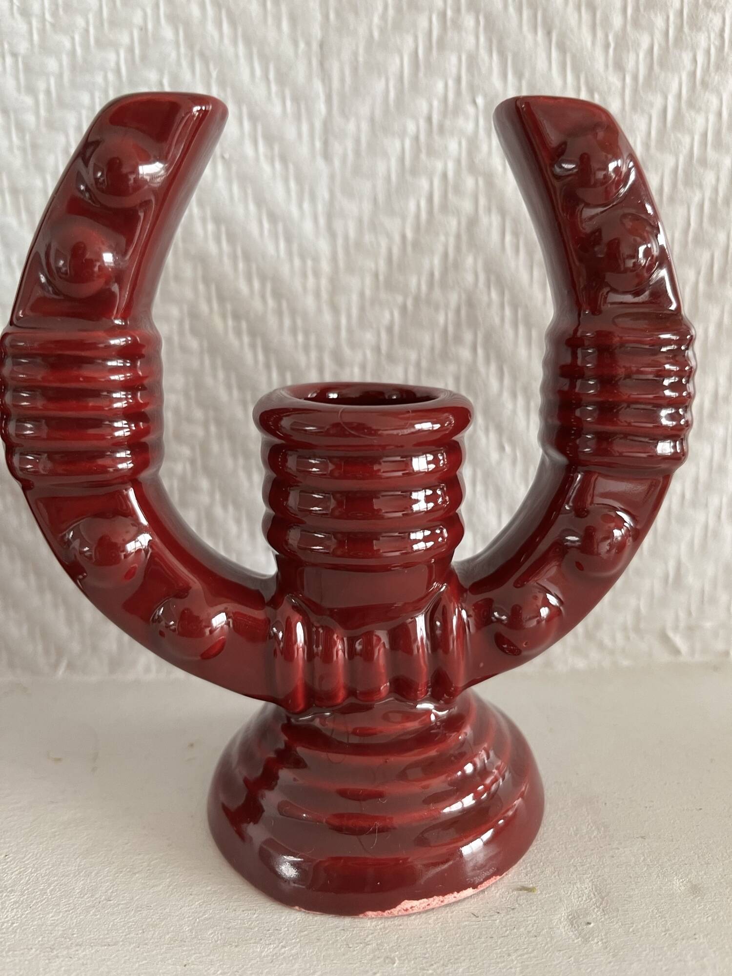 2 fifties red ceramic candle holders, horseshoe pattern