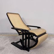Rocking lounge chair, curved wood, leather, Viennese cane design.