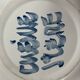 Painted and enamelled ceramic plate