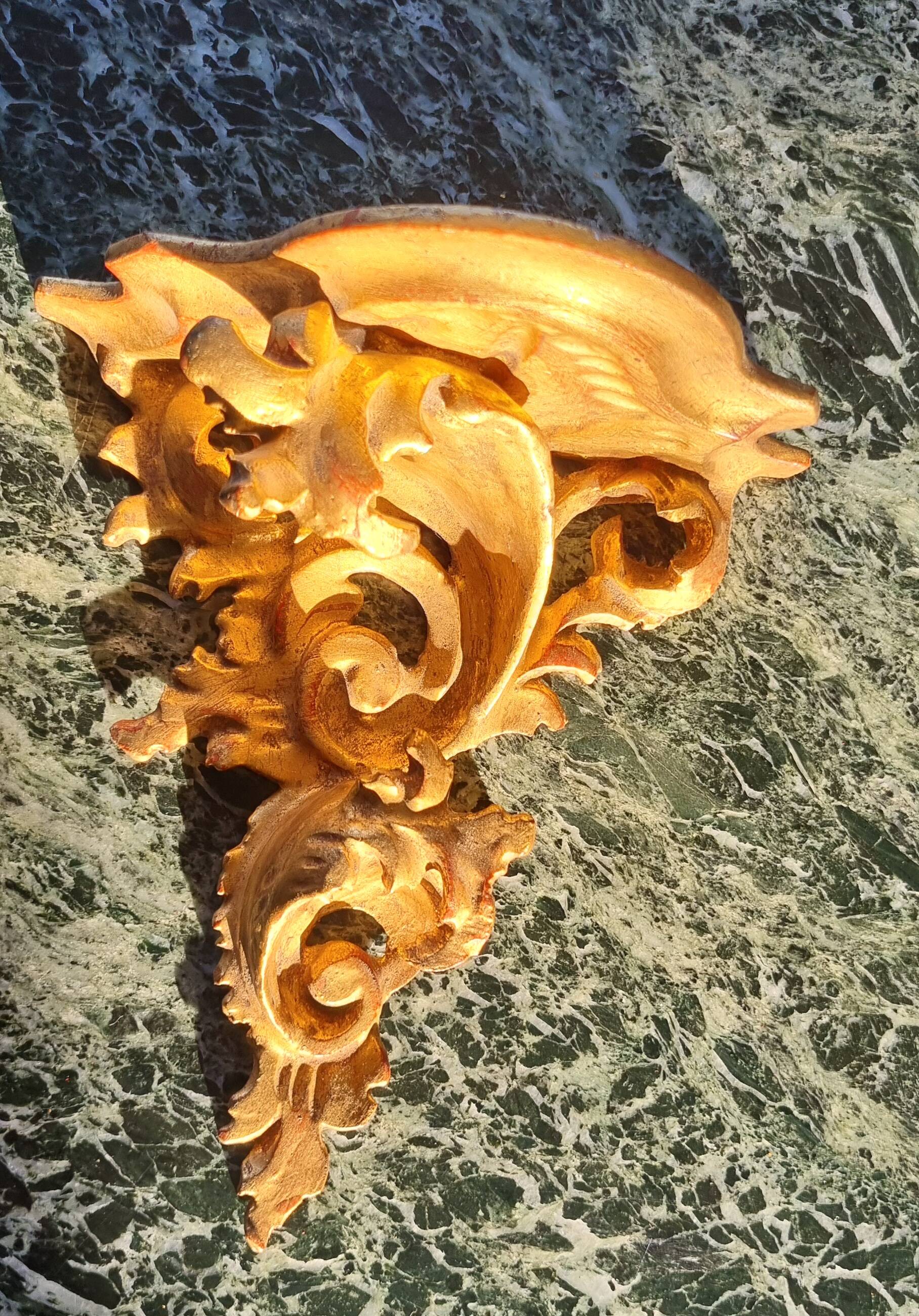Golden wall shelf in Rococo style from the 1950s.
