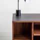 Chest of drawers in walnut and black paint, solid walnut base