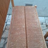2 wooden and straw benches