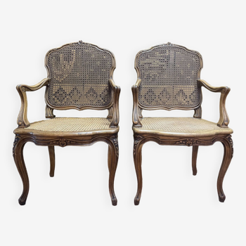 Pair of Louis XV style armchairs in canework