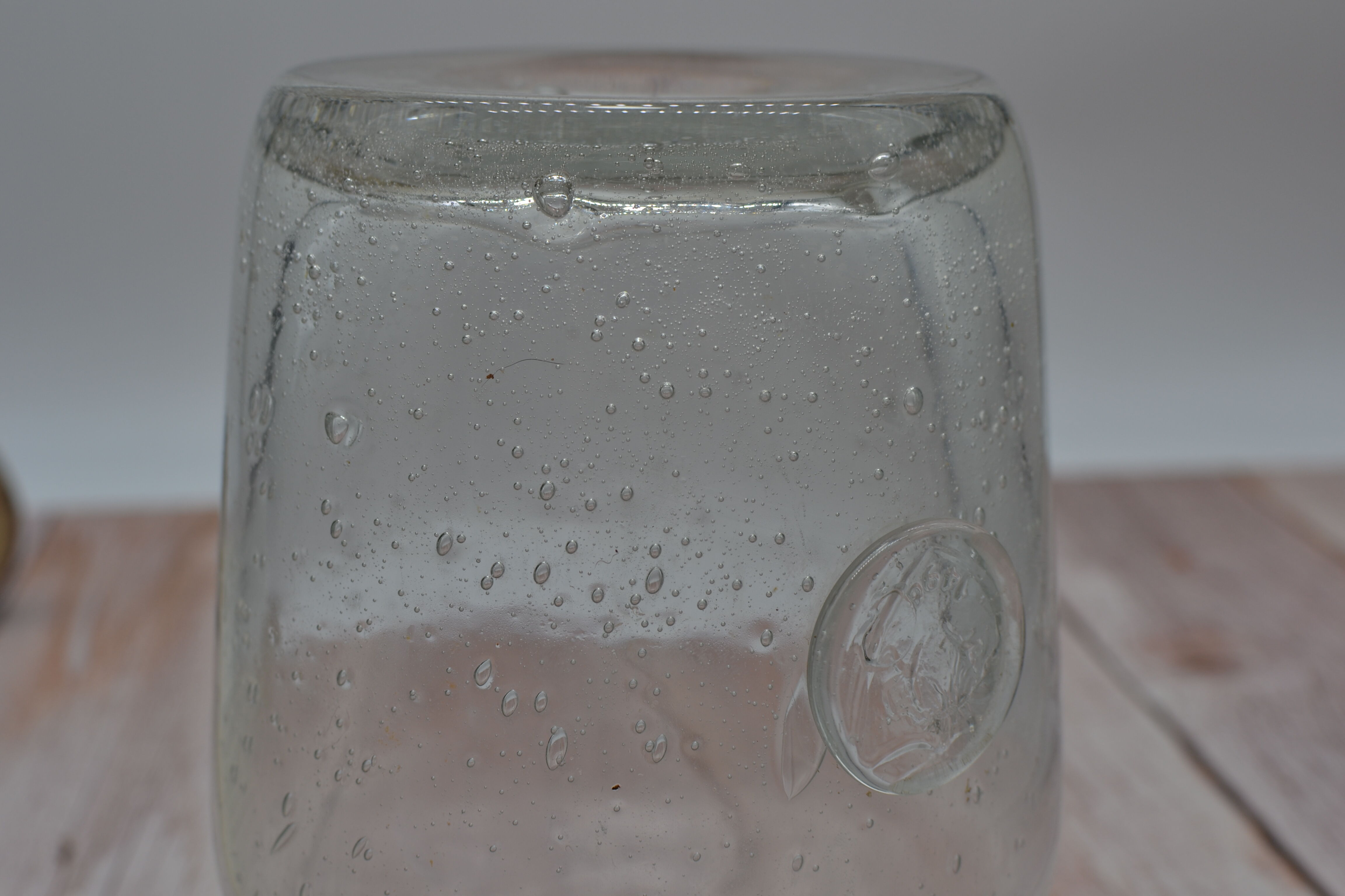 Blown glass jar with original cap