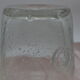 Blown glass jar with original cap