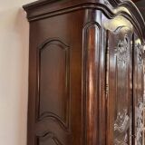 Alsatian wardrobe from the Louis XIII period in solid walnut.