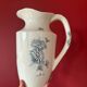 Broc, vase ancien en terre de fer