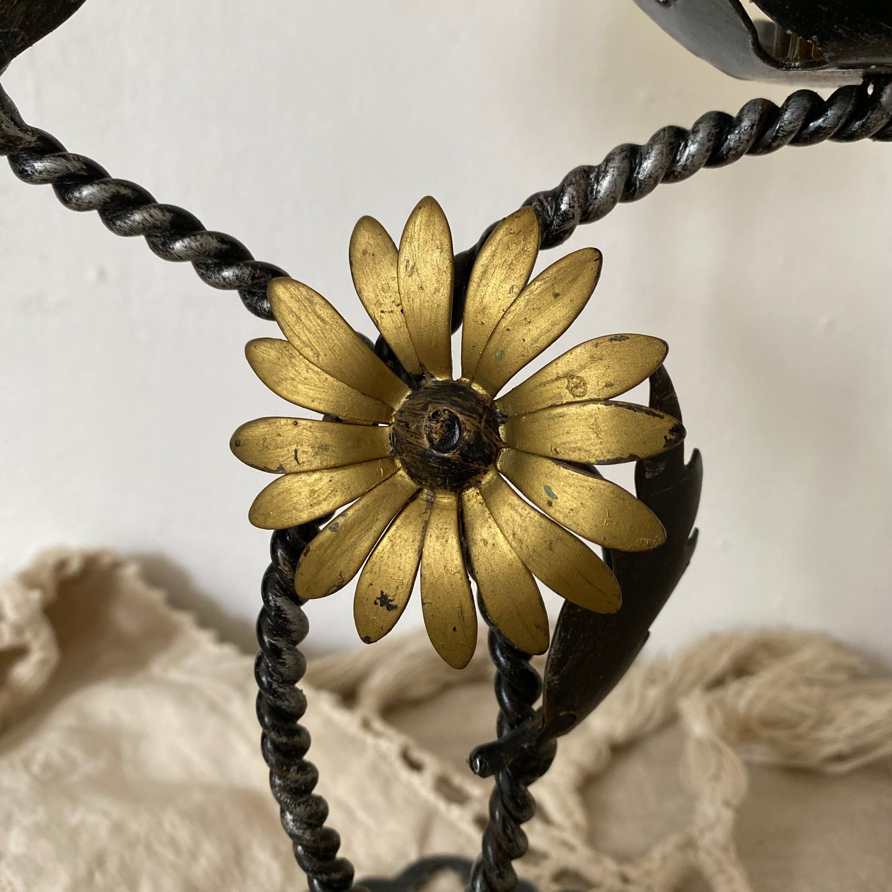 Double candle holder in metal and amber glass