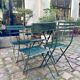 Salon de jardin, table et 4 chaises pliantes en métal vert