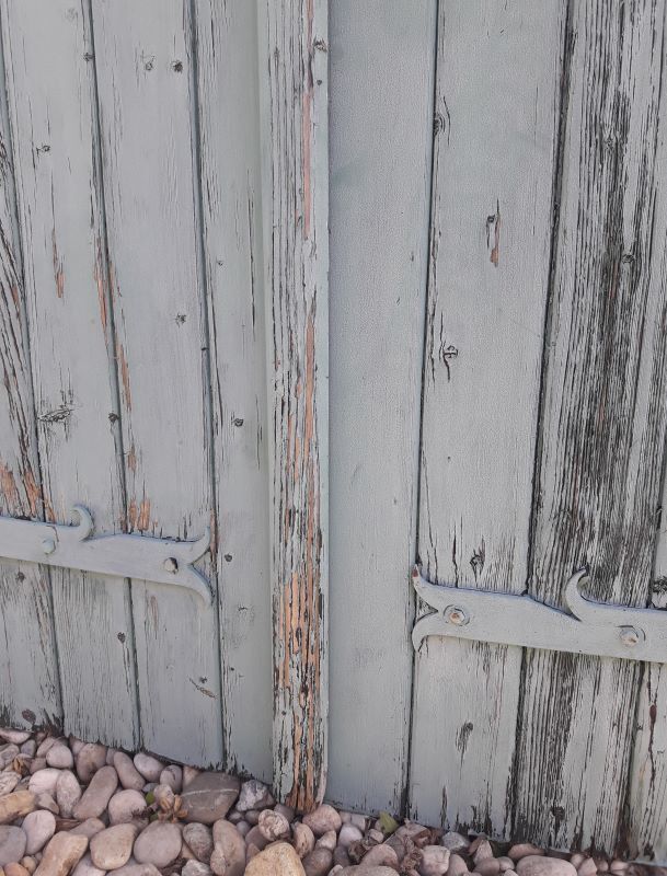 Pair of large wooden iron hanging shutters