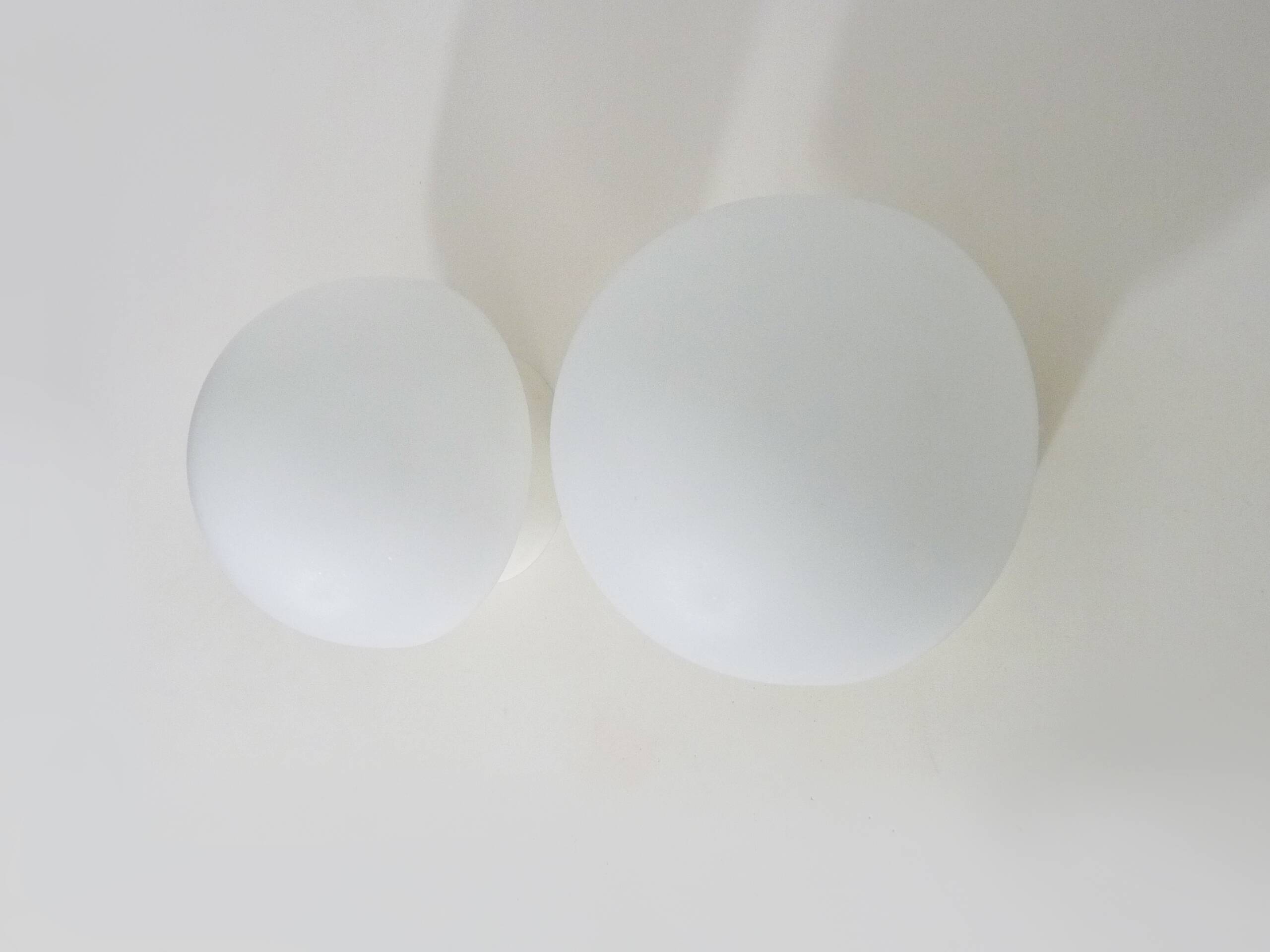 Pair of white mushroom-shaped wall lights. 1970s