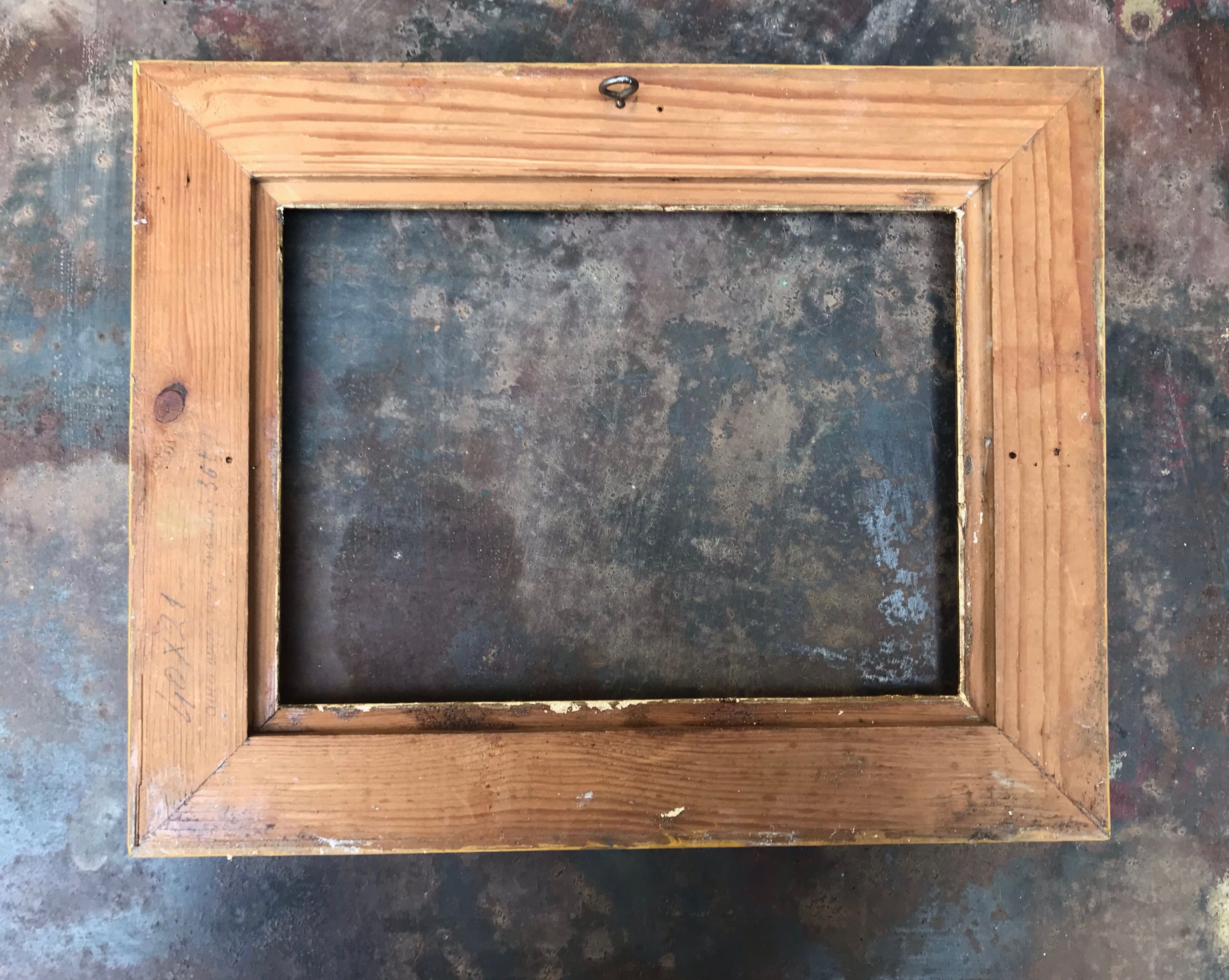 Old gilded frame with leaf